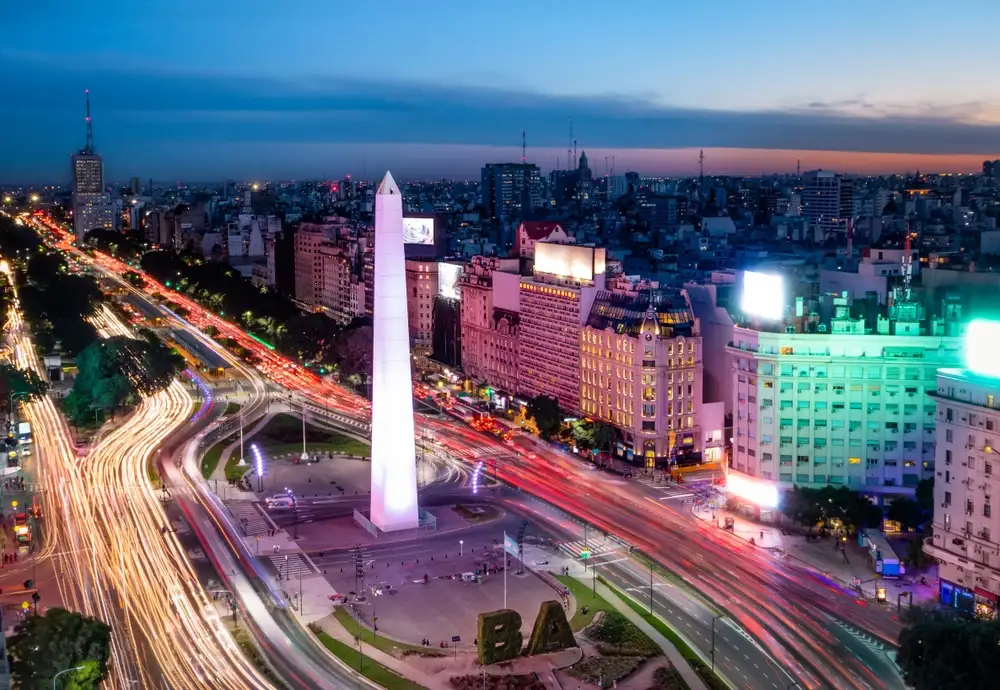 The Obelisk and 9 de Julio avenue at dusk, seen from above